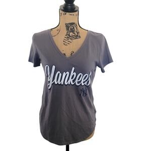 Size Small grey and white v-neck short sleeve Yankees tee, excellent condition